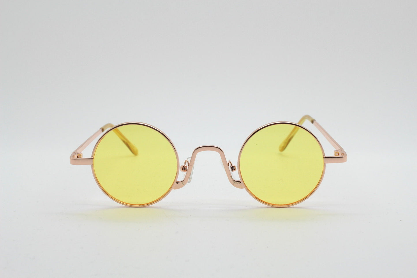 90s vintage small oval sunglasses. Imposing minimal gold victorian style frame with blazing canary yellow lenses. Steampunk. Unused BNWT