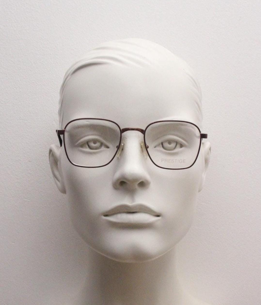 Prestige 90s vintage square metal eye glasses. Straightforward minimal design optical frames in attractive metallic brown. Prescription RX