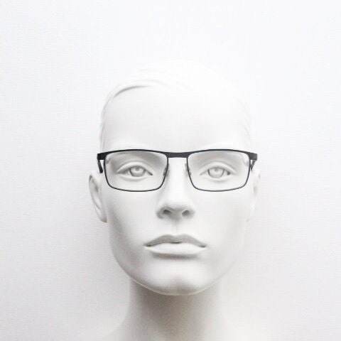 Porsche design rectangular eye glasses model 8251 made in Japan. Minimal gunmetal grey wire optical frame. Prescription RX spectacles