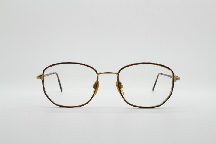 Giorgio Armani 90s vintage angular squared eye glasses made in Italy. Subtle metallic satin tiger print optical frames. Prescription RX