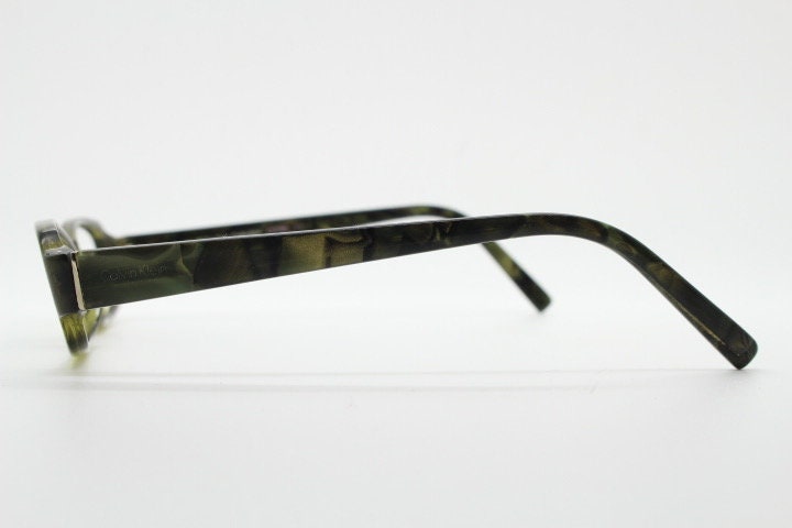 Calvin Klein Collection rectangular low profile eye glasses. Dark marbled grey acetate optical frames. Prescription eyeglasses. Vintage RX