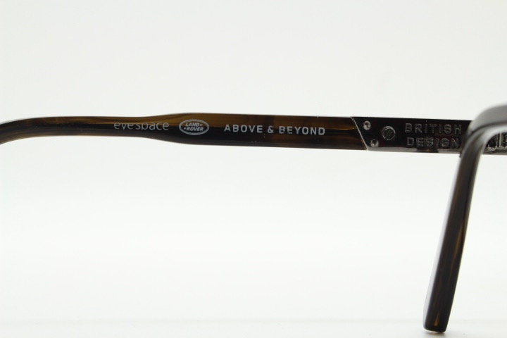 Land Rover vintage round 40s design eye glasses.Mottled brown and grey acetate optical frame with keyhole bridge. Prescription RX