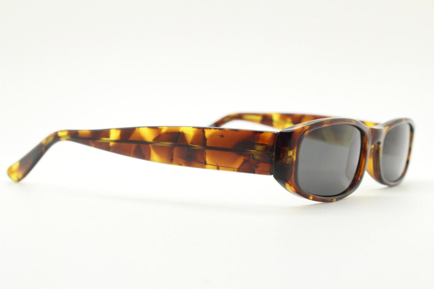 90s vintage rectangular sunglasses. Authentic and sharp low profile vibrant tortoise frame with full height arms. BNWT Unused NOS