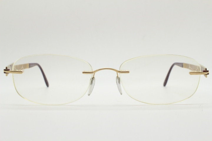 Silhouette rectangular frameless eye glasses made in Austria. Minimal optical frame with enamel and diamantes. Prescription RX. Rhinestone