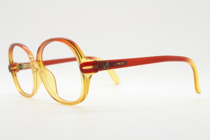 Viennaline 70s vintage round eye glasses made from Optyl. Red to yellow ombre fade optical frames. Womens NOS prescription RX eyeglasses