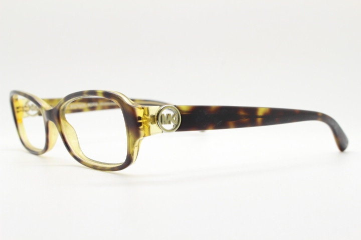 Michael Kors vintage rectangular eye glasses. Tortoise layered acetate low profile cateye optical frame. Womens prescription spectacles