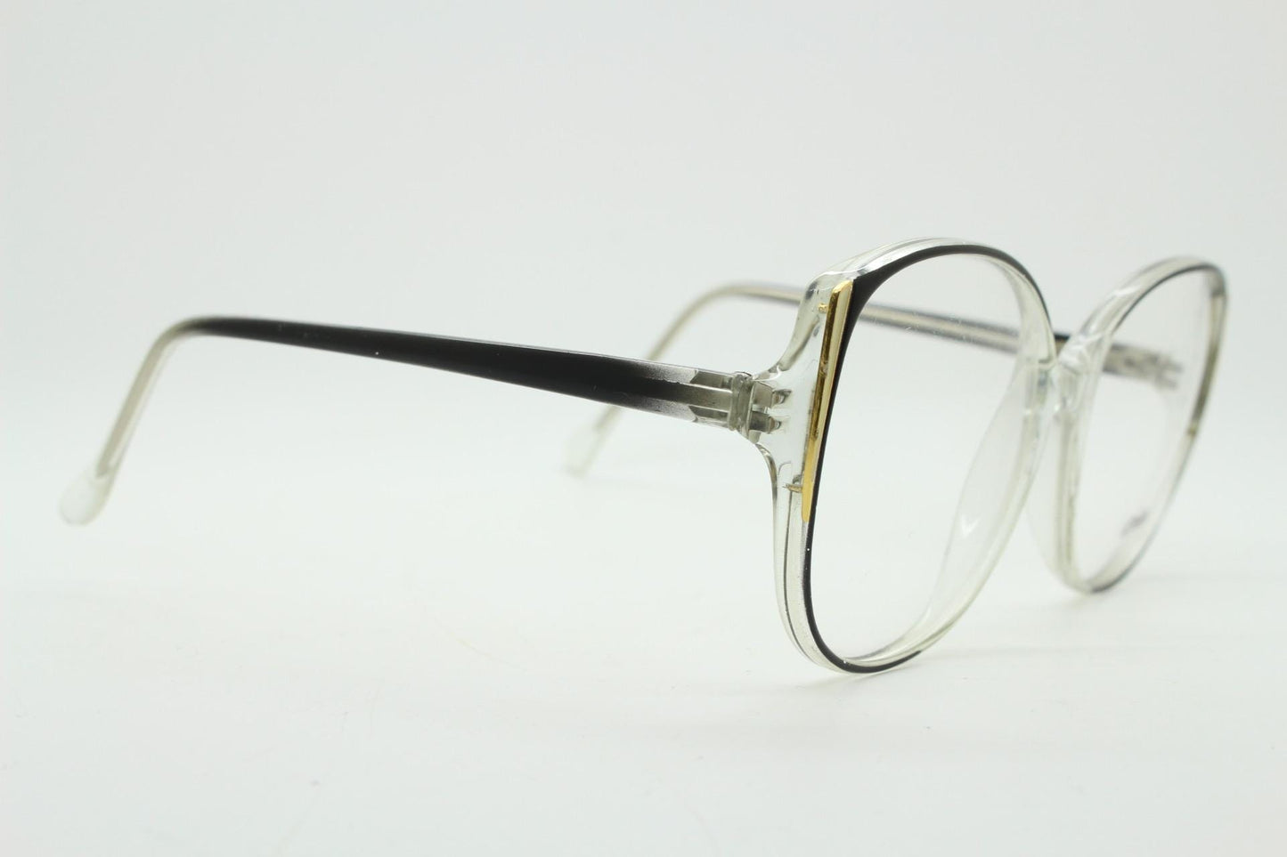 Piave 80s vintage oversized round cat eye glasses. Transparent clear optical frame with black and white overlay. Prescription NOS cateye