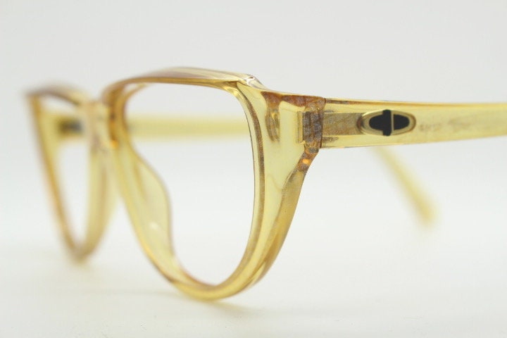Christian Dior 80s vintage flat top cat eye glasses made in Germany. Transparent yellow optical frame with abstract print. Prescription RX