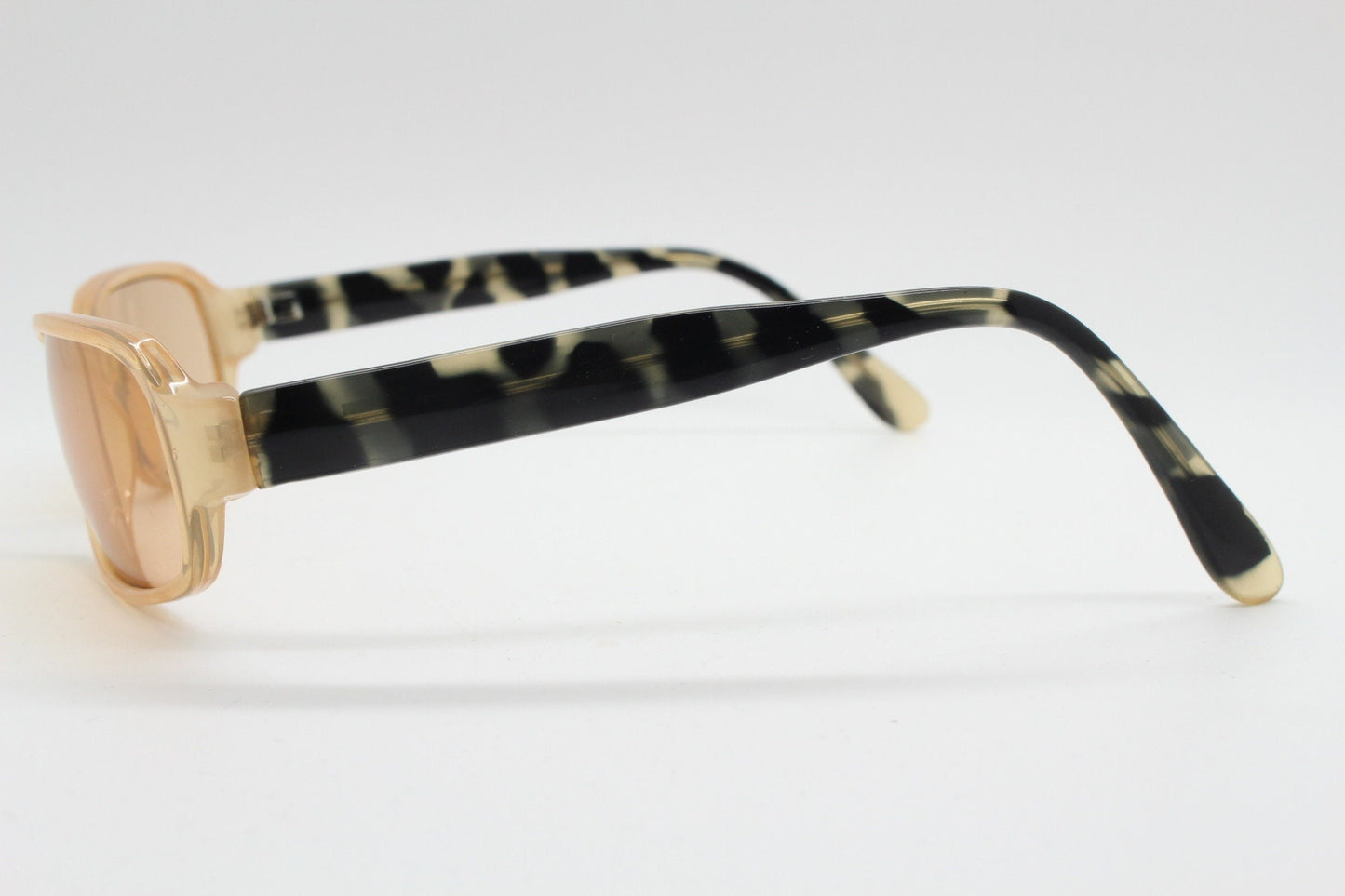 Y2K vintage curved rectangular sunglasses. Beige frame with matching lenses and contrasting tortoise arms. 2000s unused NOS. 00s