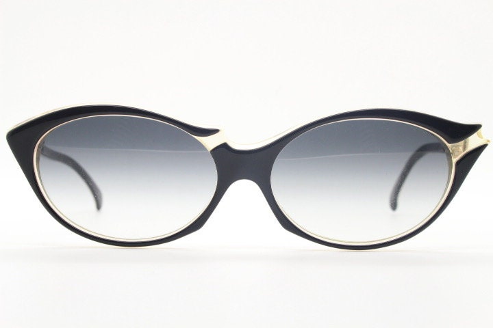 Alain Mikli Paris cat eye glasses made in France. Radical redefinition of the cateye optical frame. Womens prescription eyeglasses. RX