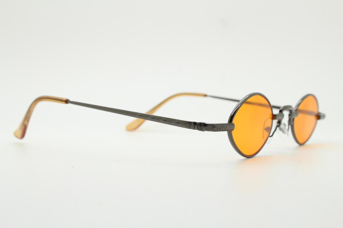90s vintage small oval sunglasses. Imposing minimal rose gold metal victorian style frame with blazing orange lenses. Steampunk. BNWT