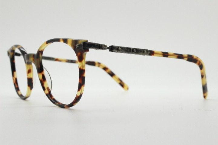 Sting 90s vintage round eye glasses made in Italy. Honey tortoise acetate optical frames. 40s retro design. Prescription eyeglasses. RX