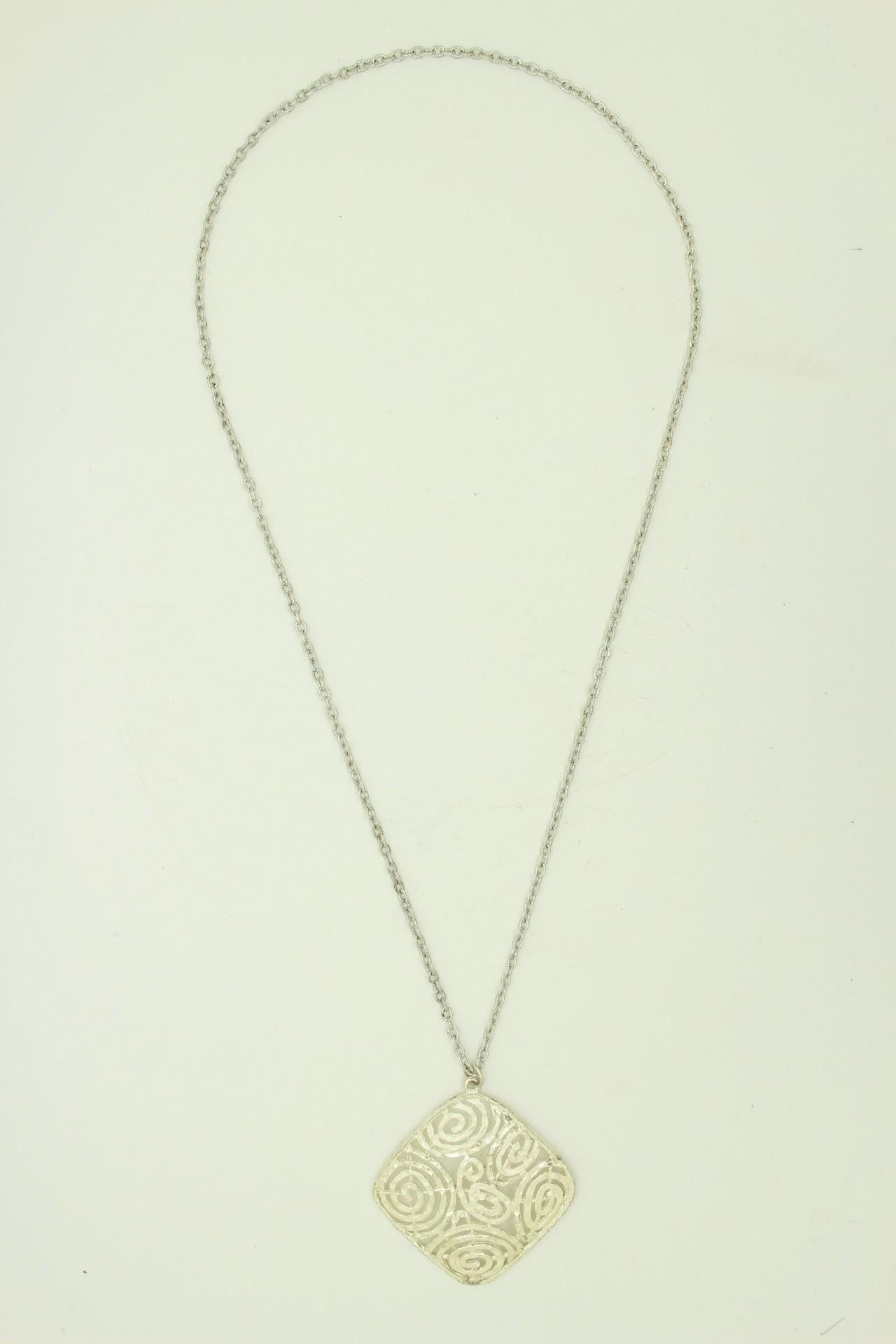 60s vintage large silver square pendant necklace made in England. Satin and matt finish with swirling paisley cut out shapes. Womens. NOS