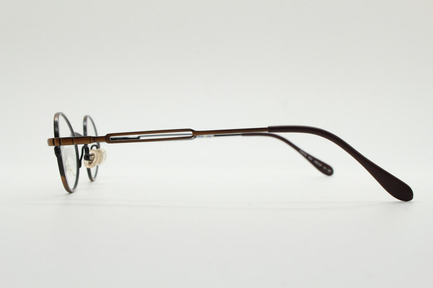 Paris Ma 90s vintage small oval eye glasses. Brushed bronze optical frames with charming arm details. Prescription. Steampunk spectacles NOS