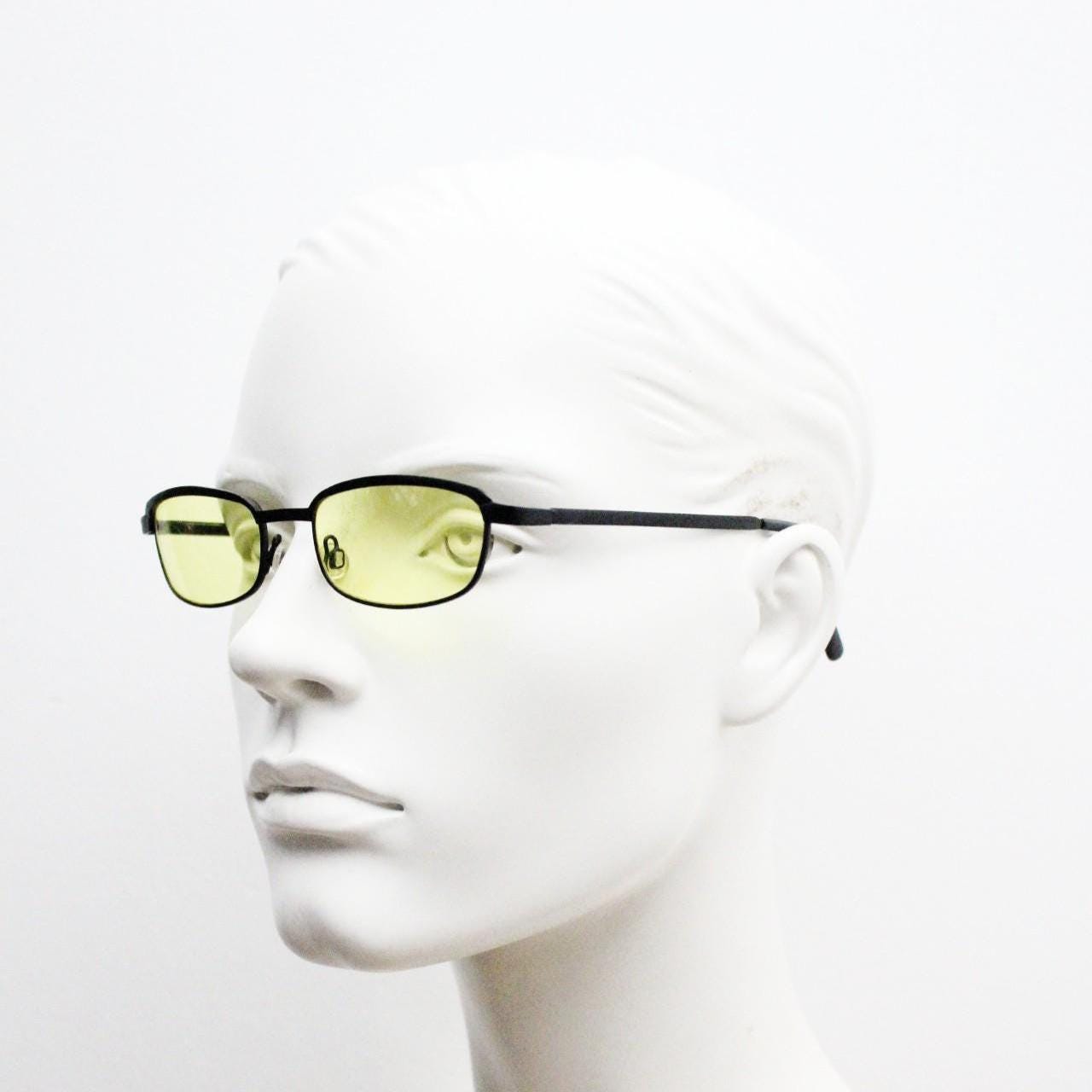 Vintage small rectangular sunglasses. Authentic quirky 90s design in a matt black solid metal frame with bright yellow lenses. 2000s. NOS