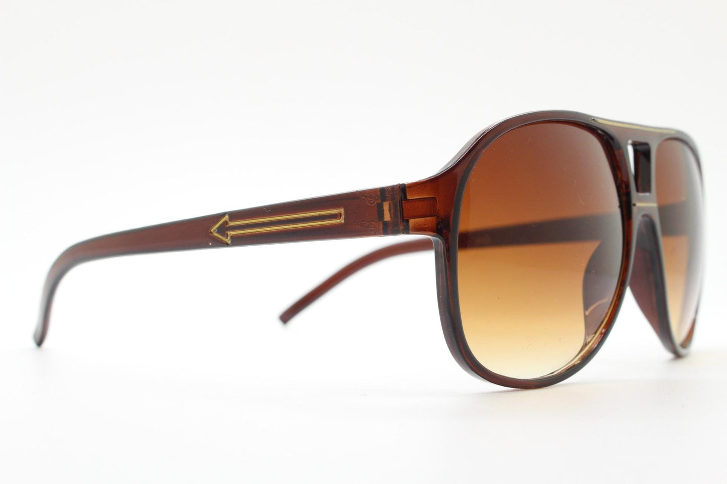 Y2K vintage aviator sunglasses. 2000's transparent brown frame with graduating lenses and gold detail. 70s design. 00's NOS aviators