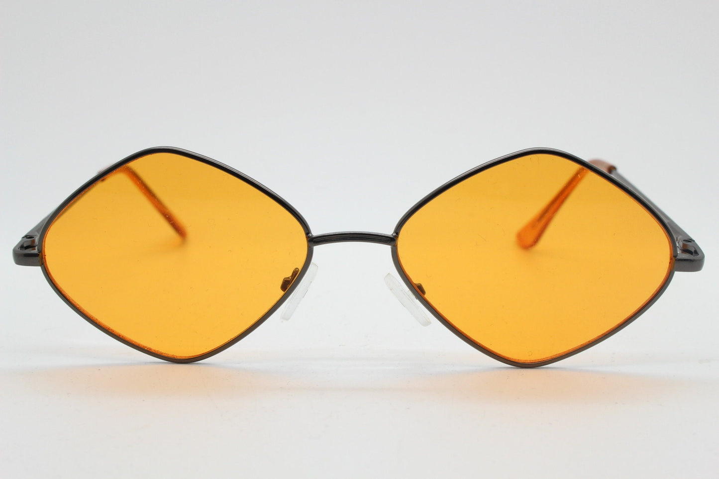 90s vintage diamond sunglasses. Minimal bronze brown psychedelic mod style frame with blazing orange lenses. Unused BNWT