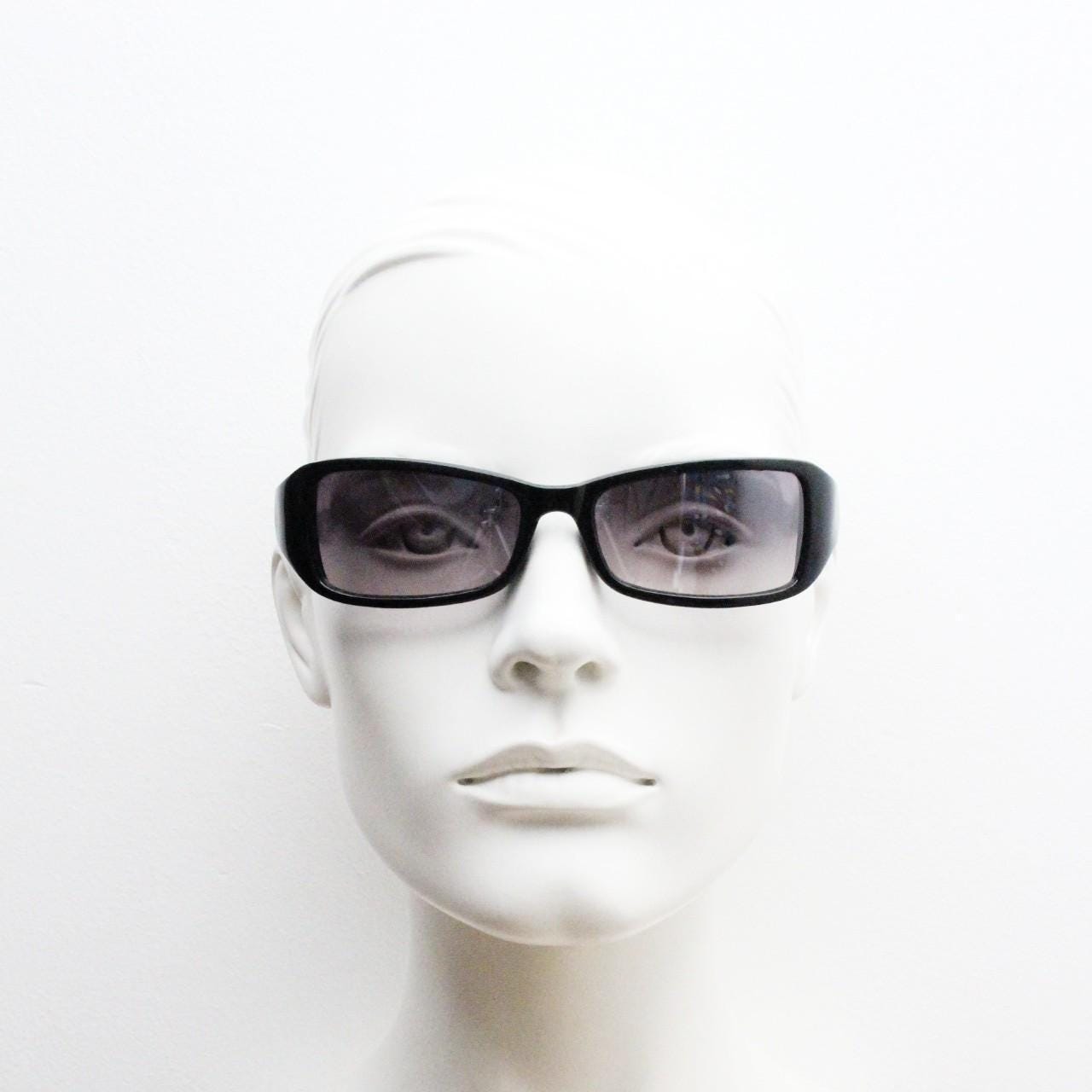 90s vintage rectangular curved wraparound sunglasses. Womens aerodynamic quality black acetate cat eye frame. Minimal shield design. NOS