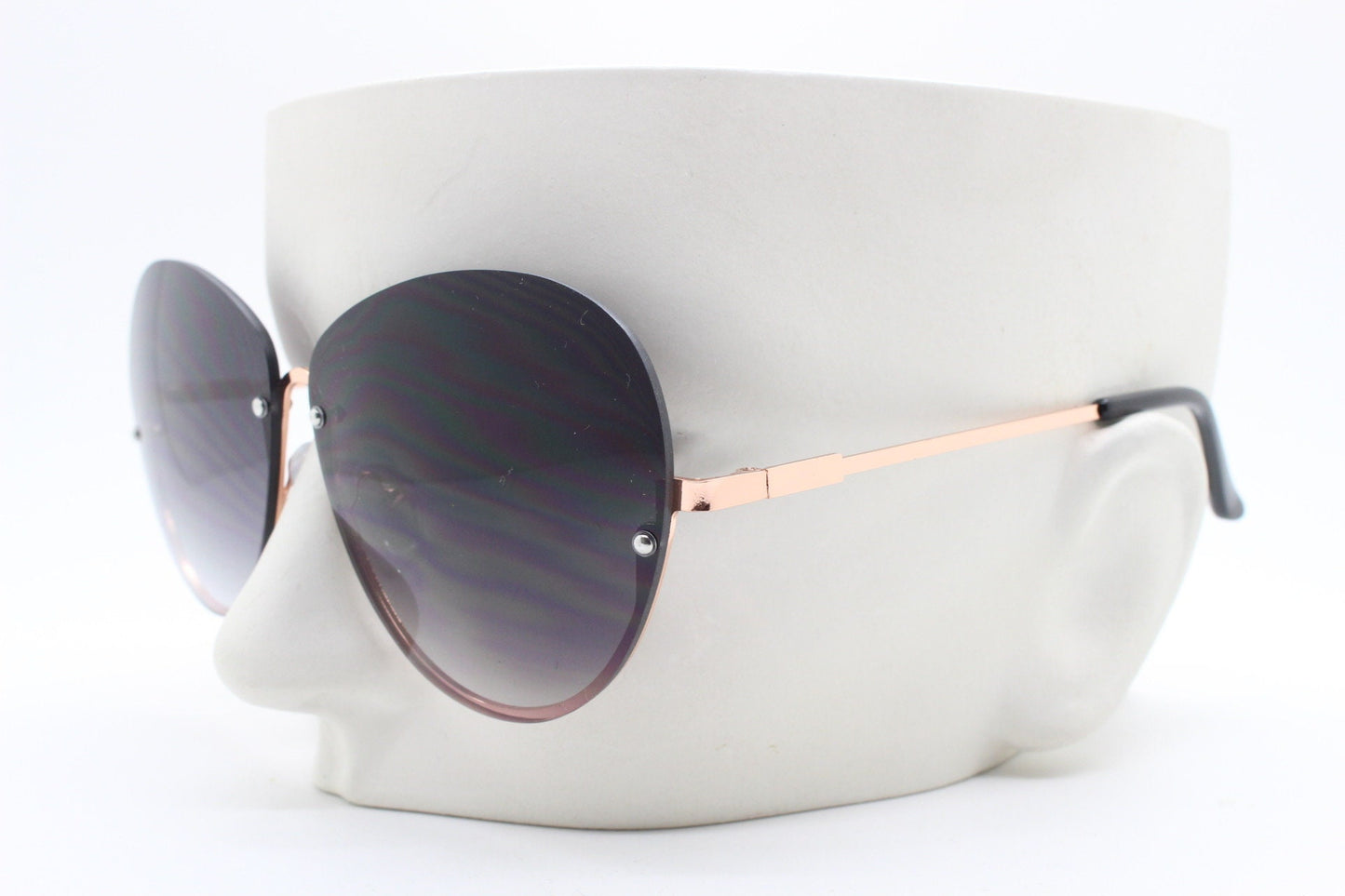Y2K vintage large rimless sunglasses. Women's 70s style half frame design with graduating black lenses and gold arms. 2000s BNWT