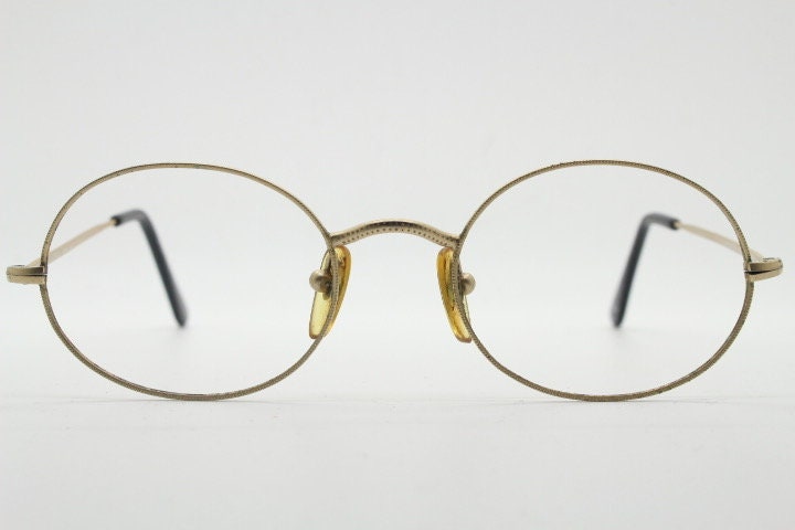 Giorgio Armani 90s vintage oval eye glasses made in Italy. 30s design gold optical frames in a satin finish. Prescription RX
