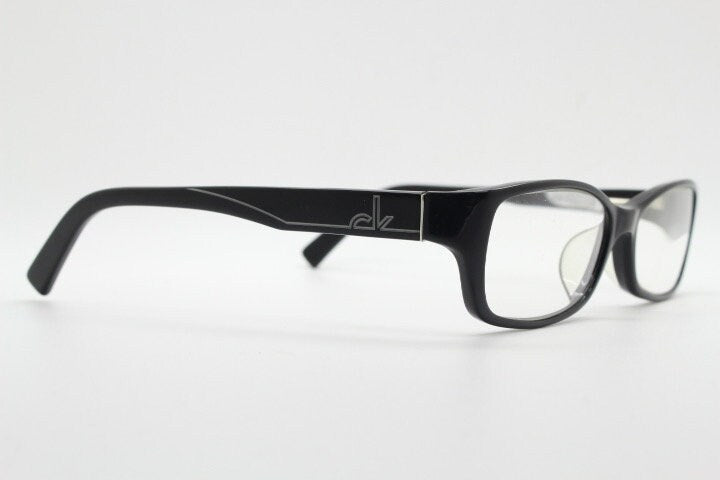 Calvin Klein rectangular glasses model 5714. Black gloss low profile acetate optical frames. Prescription eyeglasses. RX vintage spectacles