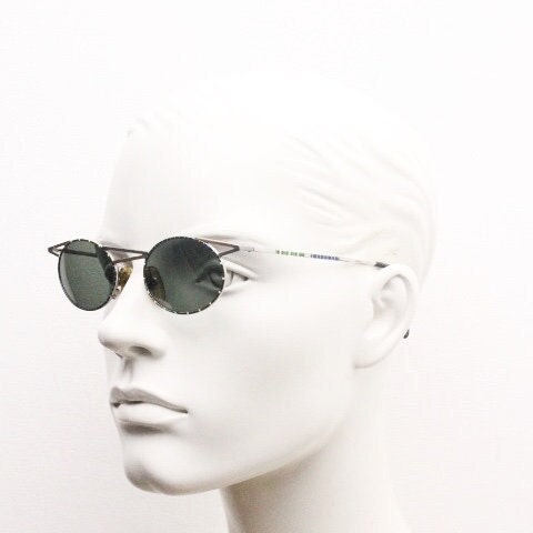 Taxi 90s vintage oval sunglasses. Unique innovative abstract design with extraordinary multi colour print. Casanova