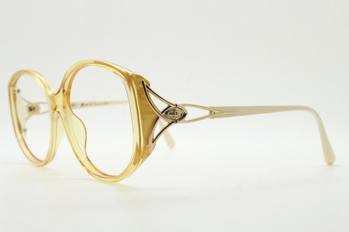 Christian Dior 70s vintage big round eye glasses made in Austria. Brown Optyl optical frames with distinctive logo. Prescription RX. NOS