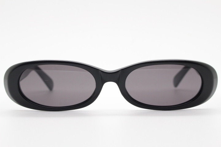 Guess vintage 90s low profile oval sunglasses. All black gloss quality acetate finish. New Old Stock