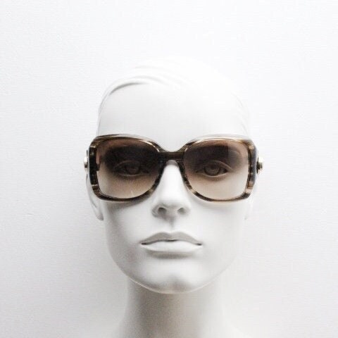 Gucci Y2K vintage oversized square sunglasses made in Italy. Transparent mottled brown frame with glitter sparkles and big stand out logo