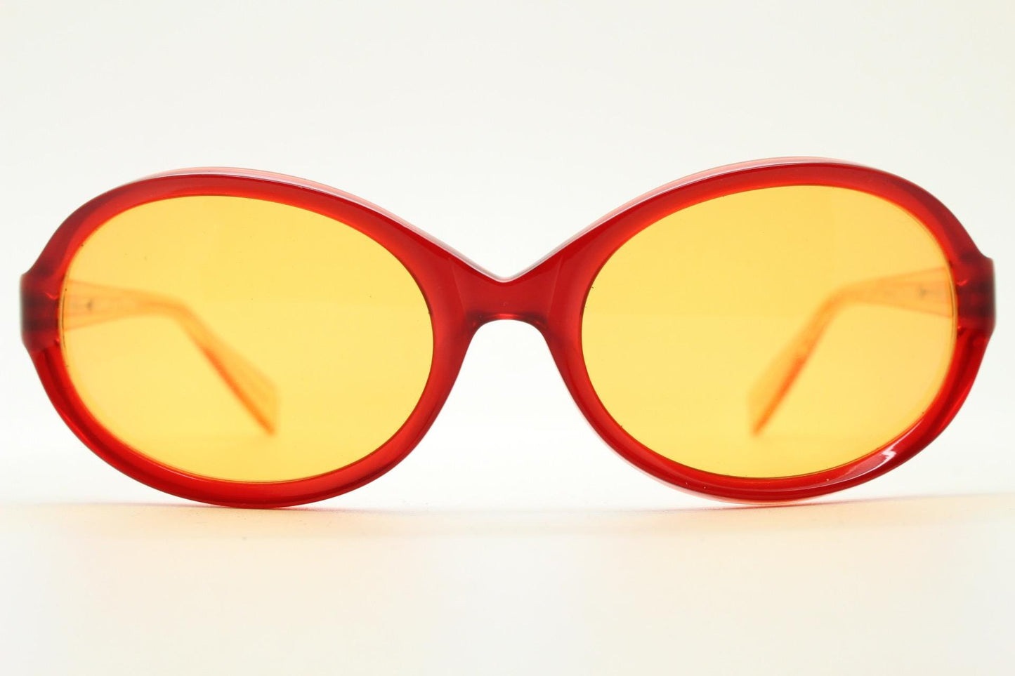 Alain Mikli Y2k vintage mini goggle sunglasses. Red transparent oval curved frame with blazing orange lenses. Definitive 2000s NOS