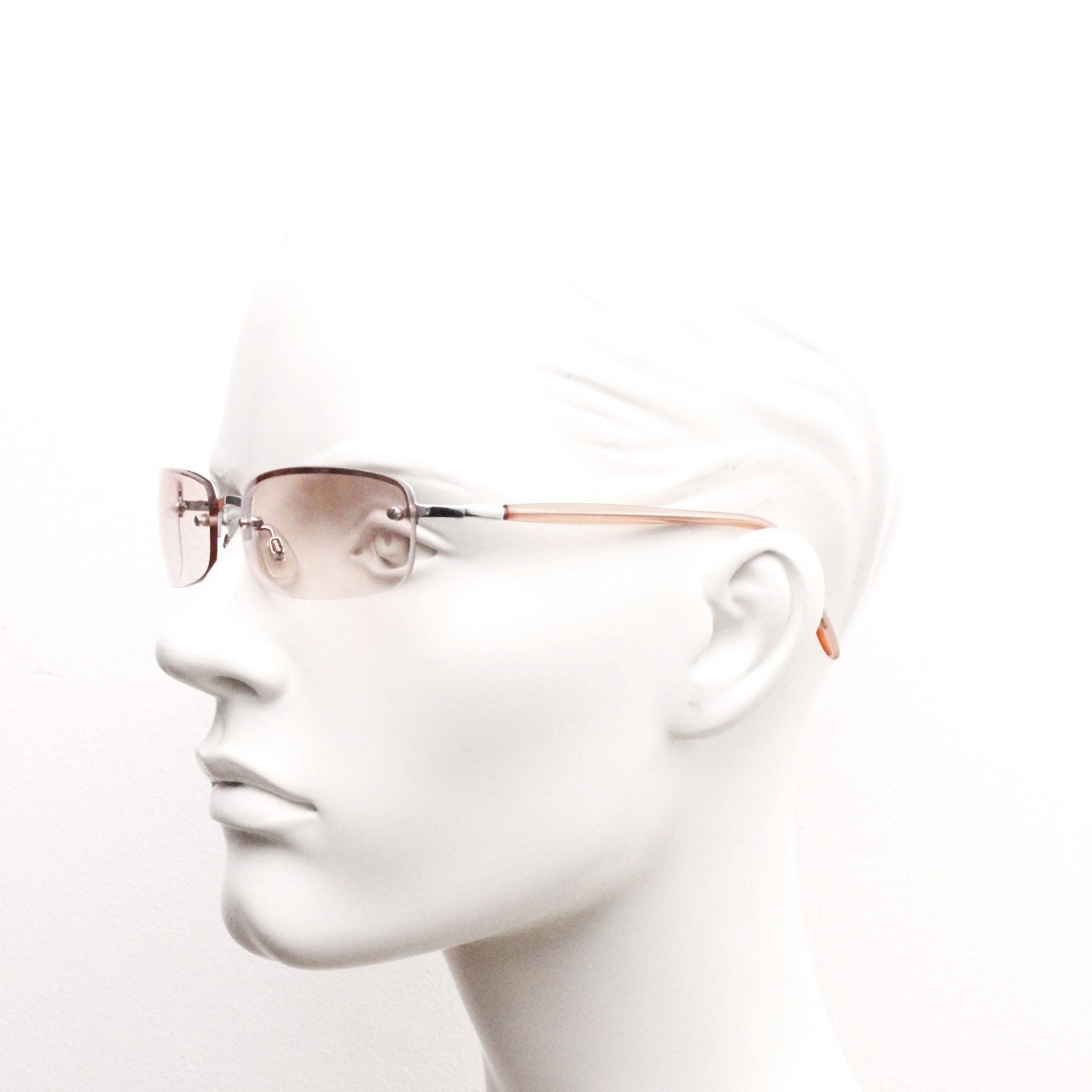Y2K vintage wrap around rectangular sunglasses. Half frame in sharp chrome with extra light tone pink lenses. Rave 2000's. 00's NOS