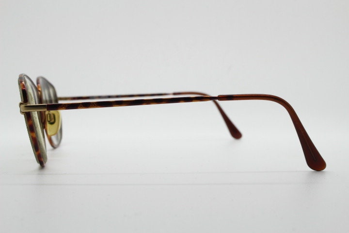 Giorgio Armani 90s vintage angular squared eye glasses made in Italy. Subtle metallic satin tiger print optical frames. Prescription RX