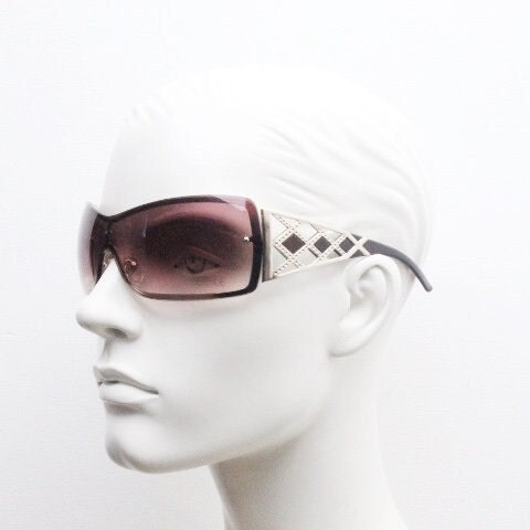 Y2K vintage visor sunglasses. 2000's brown wraparound mono lens mini mask shield design with stupendous lattice arms. Bug eye. Unworn NOS
