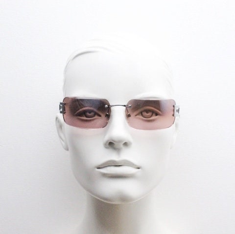 Y2K vintage rectangle frameless visor sunglasses. 2000's chrome trim wrap around with pink curved and bevelled lenses. 00's NOS