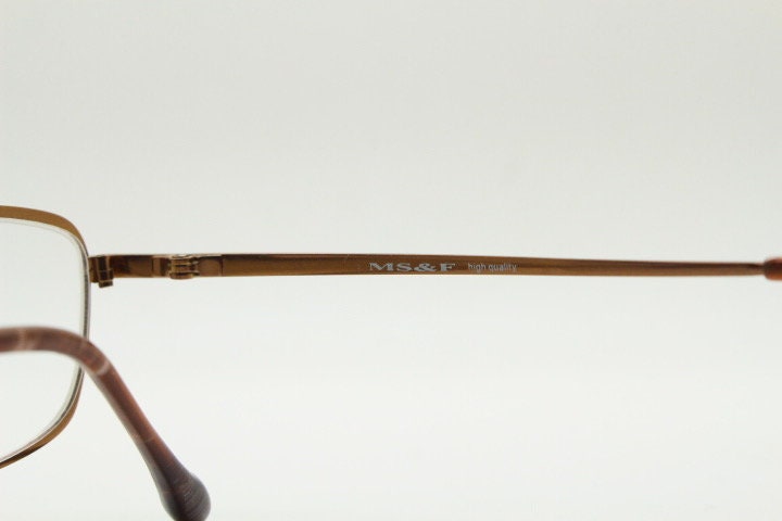 MS&F 90s vintage rectangular eye glasses. Flexible metallic brown chrome flat metal optical frame. Prescription RX. NOS
