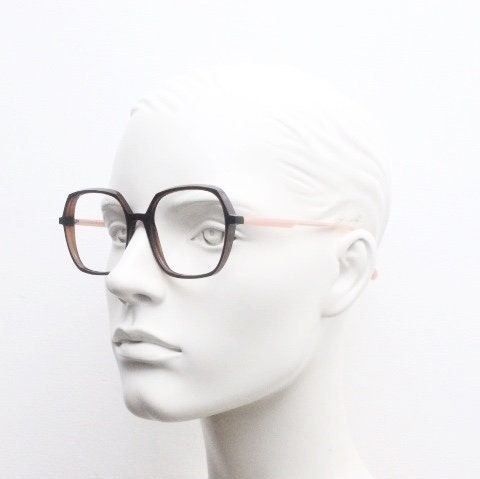 Caroline Abram square hexagon eye glasses model Caline. Dark brown acetate optical frame with pink arms. Prescription RX spectacles