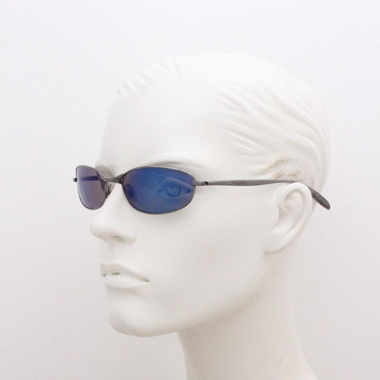 90s vintage oval small bug eye sunglasses. Curved grey chrome finish solid metal frame with blackout mirror lenses. Quality NOS