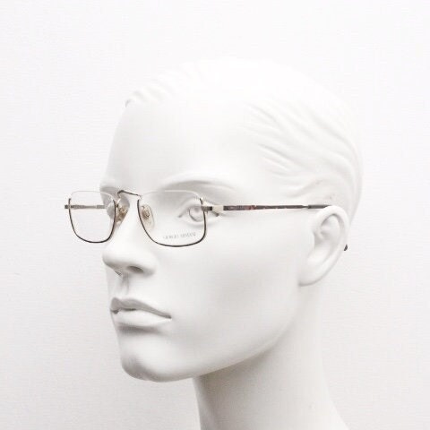 Giorgio Armani rectangular eye glasses made in Italy. Half frame underwire with metallic tortoise enamel. Prescription optical eyeglasses RX