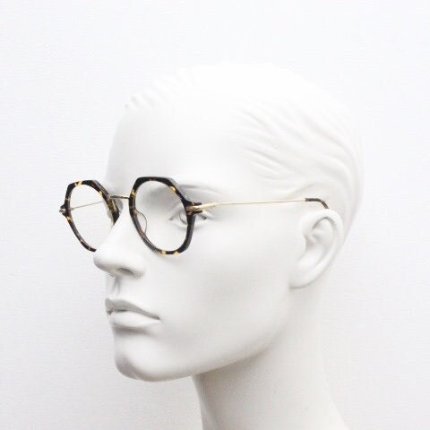Kaleos hexagon eye glasses model Trevethyn made in Italy. Amber tortoise acetate optical frames with gold arms. Prescription eyeglasses. RX