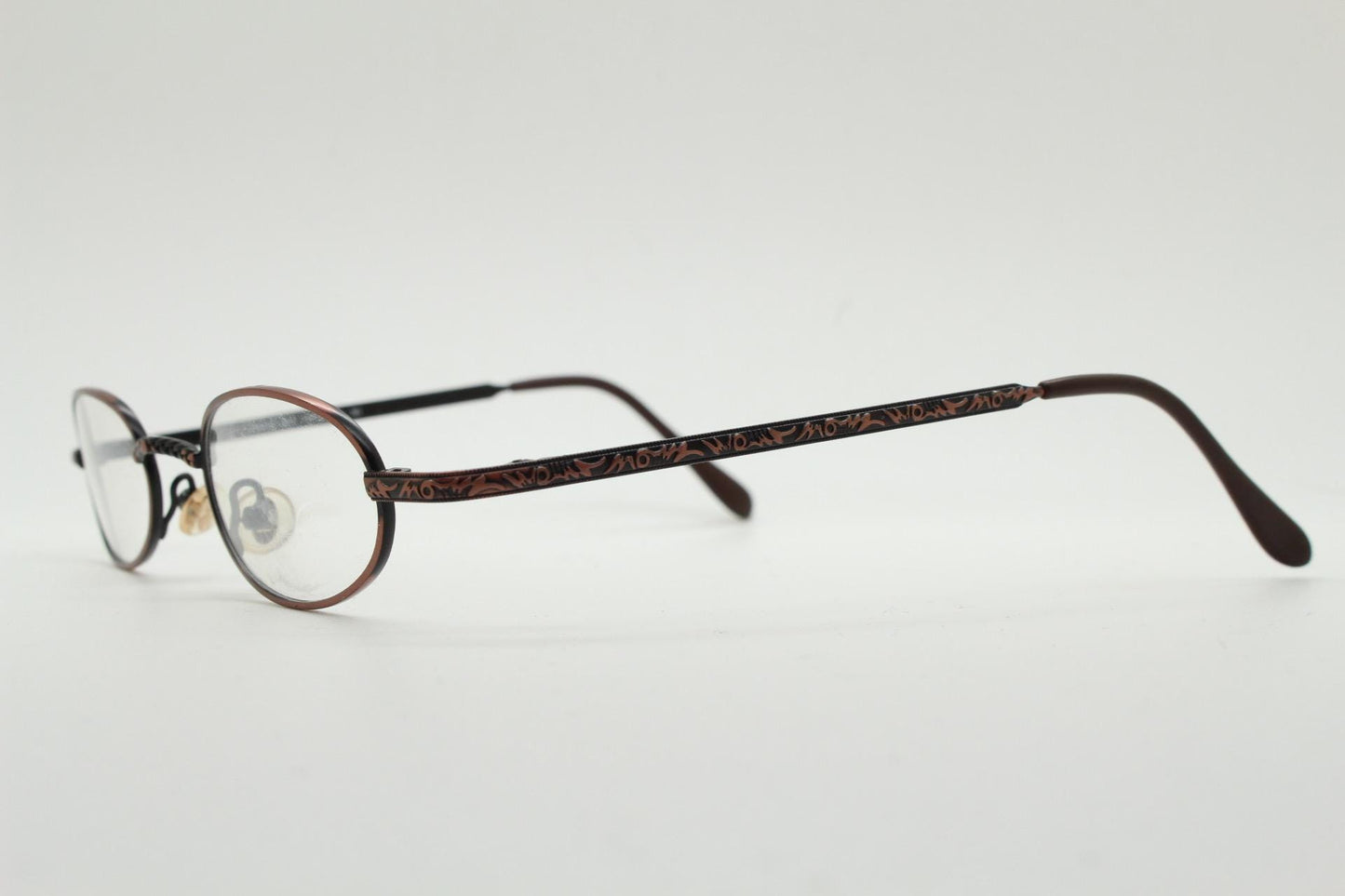 Paris Ma 90s vintage small oval eye glasses. Brushed copper finish optical frames with ornate details. Prescription steampunk spectacles NOS