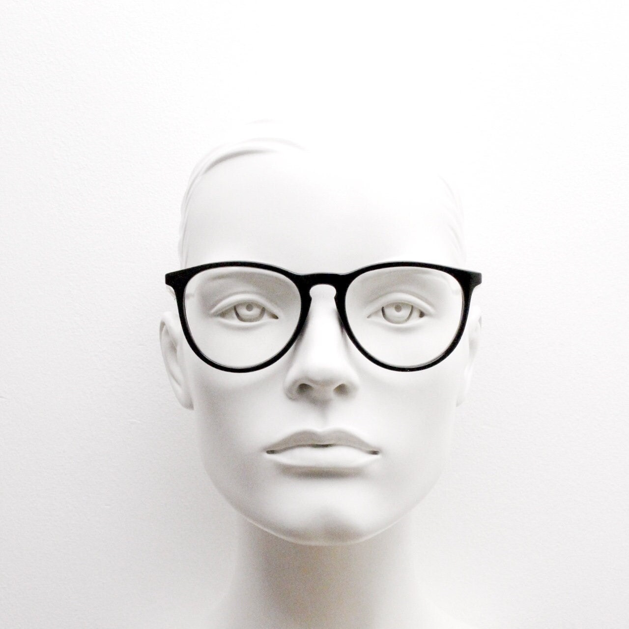 90s vintage black slim glasses. Slightly oversized optical frames in black gloss. Prescription eyeglasses with clear lens. RX spectacles