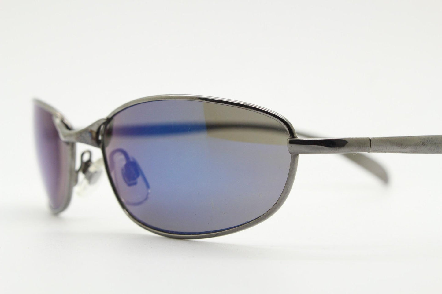 90s vintage oval small bug eye sunglasses. Curved grey chrome finish solid metal frame with blackout mirror lenses. Quality NOS
