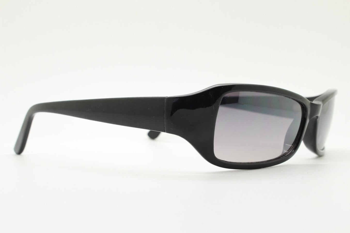 90s vintage rectangular curved wraparound sunglasses. Womens aerodynamic quality black acetate cat eye frame. Minimal shield design. NOS
