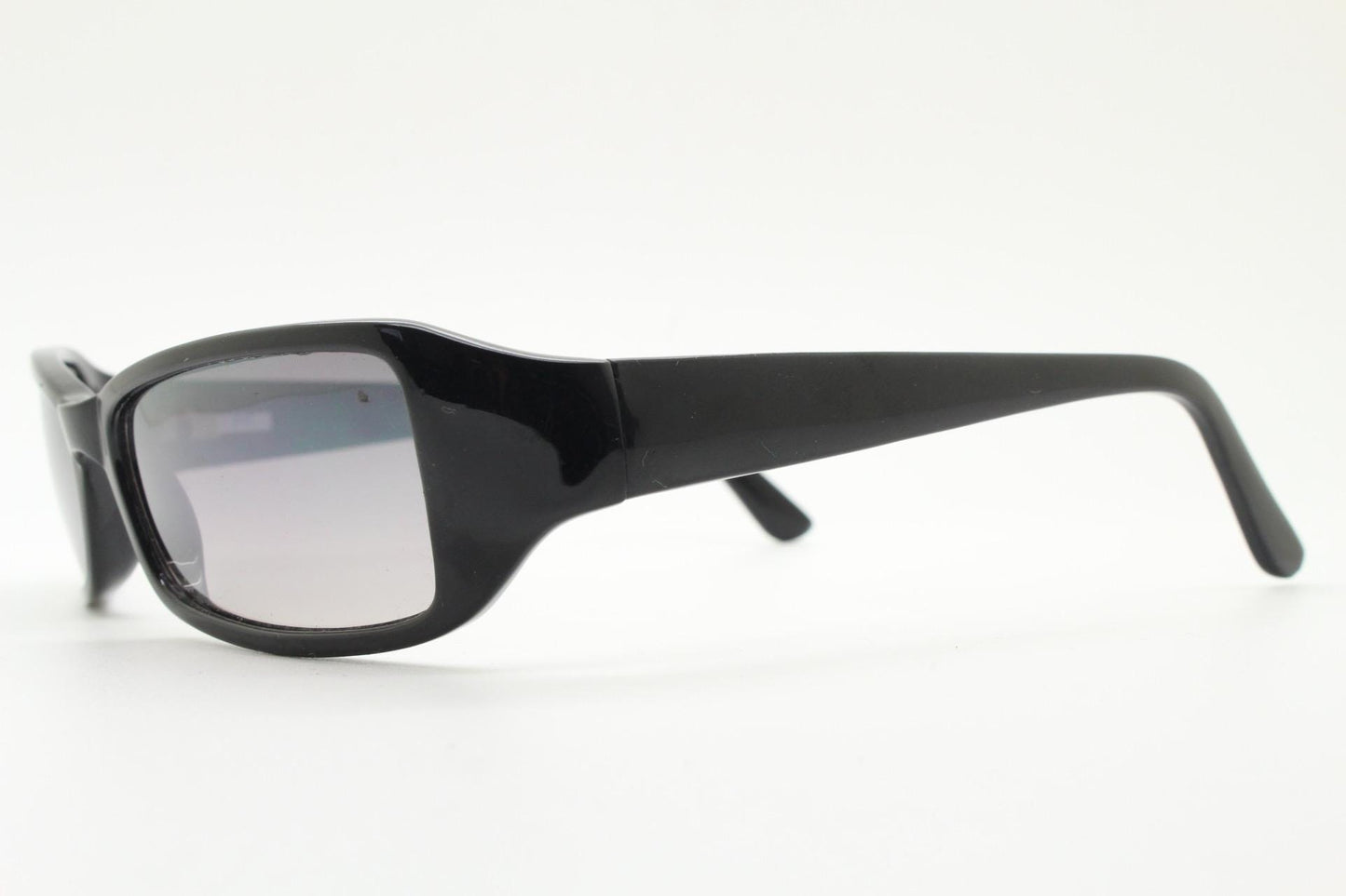 90s vintage rectangular curved wraparound sunglasses. Womens aerodynamic quality black acetate cat eye frame. Minimal shield design. NOS