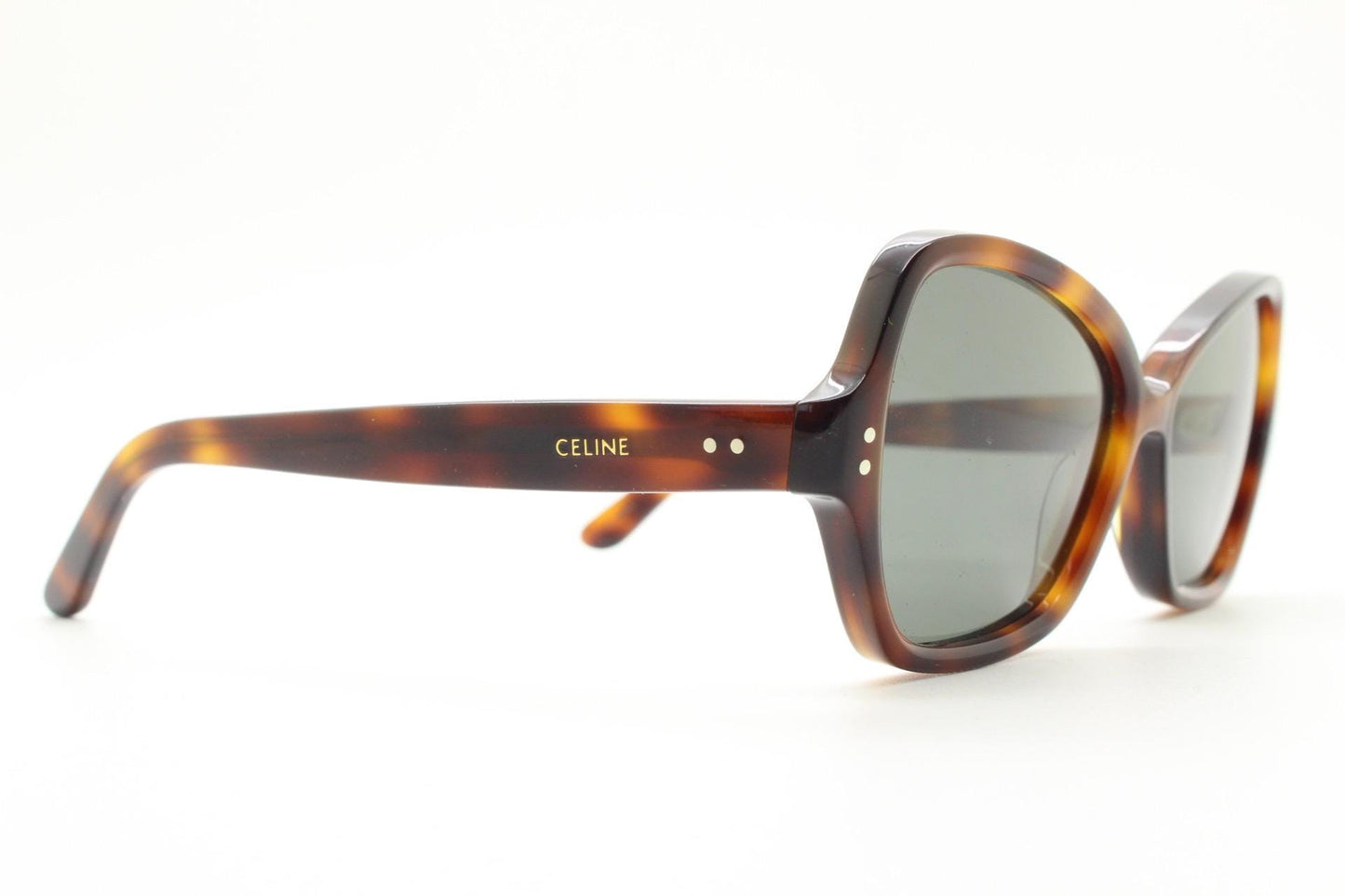 Celine Paris vintage angular cat eye sunglasses made in Italy. Tortoise butterfly frame in good proportions with green lenses. Womens Y2K
