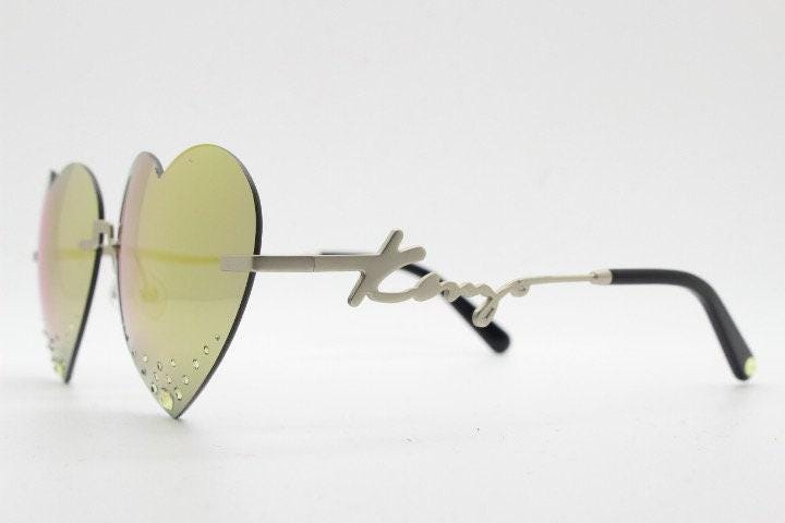 Kenzo mirror heart shaped frameless sunglasses model KZ40005U. Instant classic design with diamantes and big spell out arm logo. NOS