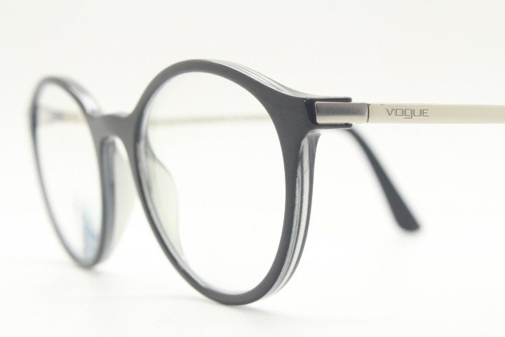 Vogue womens oval eye glasses model 5223. Black acetate optical frames with metal arms. Prescription eyeglasses. RX spectacles