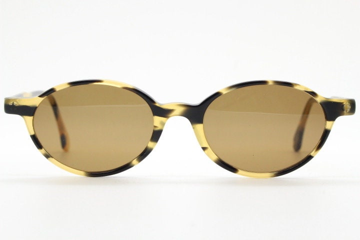 Robert La Roche 90s vintage oval sunglasses. Vibrant honey and mottled brown acetate undersized frame with plain brown lenses. NOS