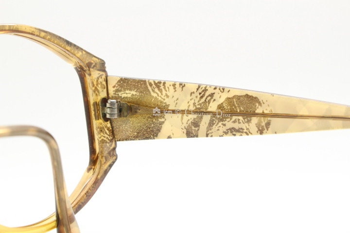 Christian Dior 70s vintage round eye glasses. Transparent honey colour optical frame with abstract gold sparkle patterns. Prescription RX