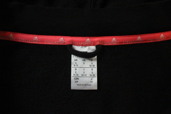Stella Mc Cartney for Adidas Stellasport vintage zipper hoody. Black batwing track top with pink double zip detachable hood and tail section